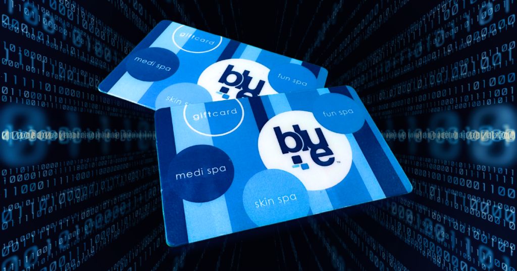 Two overlapping blue spa gift cards with the “blue” logo, featuring circular labels like “giftcard,” “medi spa,” “skin spa,” and “fun spa,” set against a digital tunnel background of glowing code.