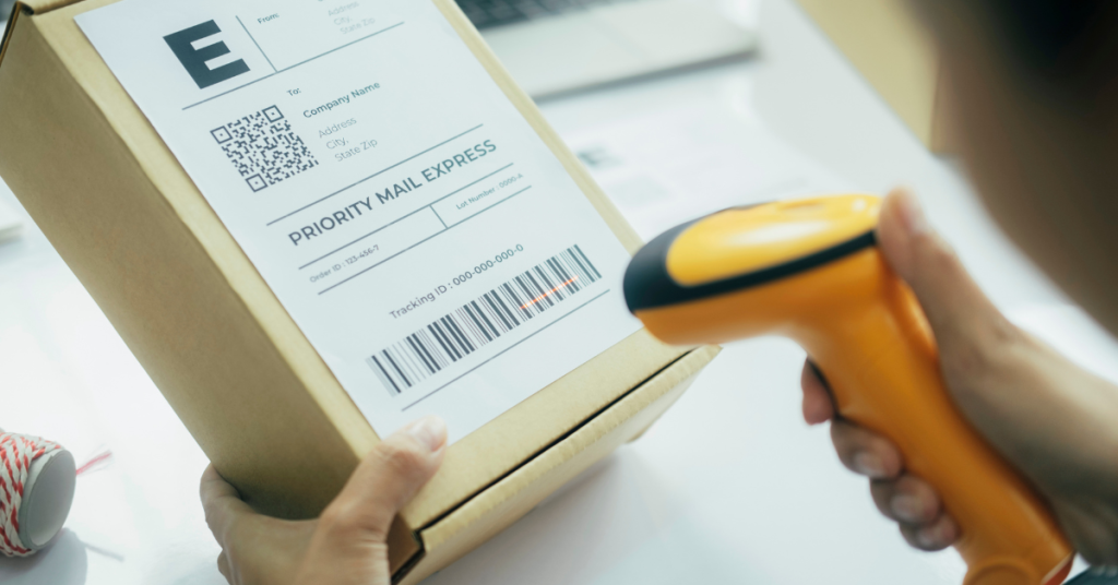 Person scanning a barcode on a package.